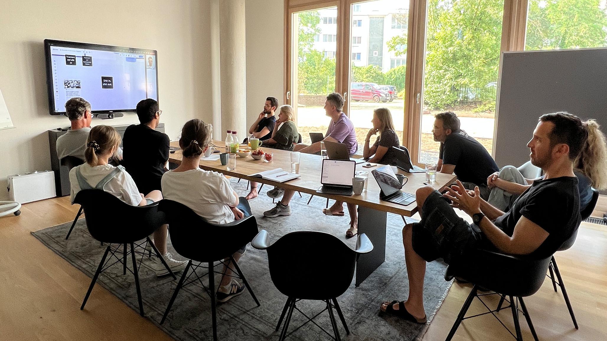 Teammeeting bei Magellan